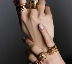 Colored Diamond Pear Cut Ring in Yellow Gold