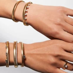 White Diamonds Feelings Bangle Bracelet in Yellow Gold